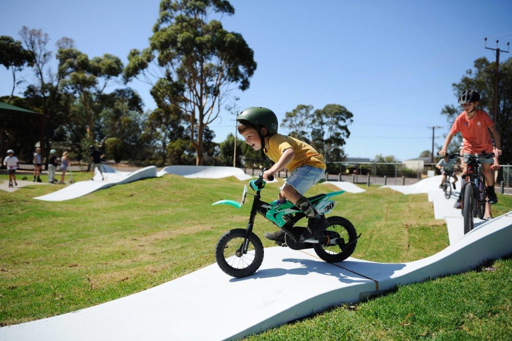 What is a Modular Pumptrack? Children riding precast concrete pump track on Australia Day 2020